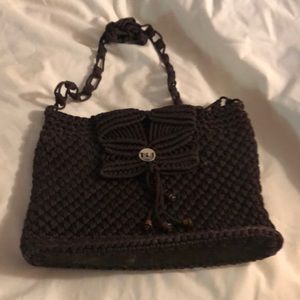 Hand woven Peruvian strap purse.